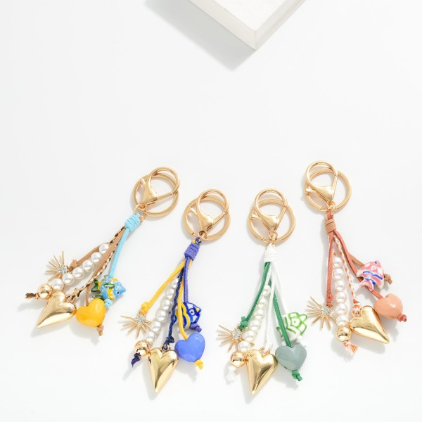 Beach Key Ring Featuring Fish, Pearls, & Gold Tone Charms 

- Approximately 6" L 