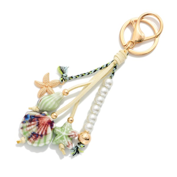 Beach Key Ring Featuring Shells, Pearls, & Gold Tones 

- Approximately 6" L 