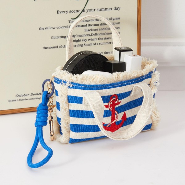 A classic structured mini handbag in a bold nautical stripe pattern with an embroidered anchor motif, top handles, and a removable wrist strap. Timeless maritime style with broad seasonal appeal — from summer beach outings to everyday coastal-inspired looks. Lightweight and polished with a boutique-ready finish, it resonates with shoppers who love preppy, nautical aesthetics. A versatile seller that fits naturally into summer, coastal, and lifestyle accessories assortments.