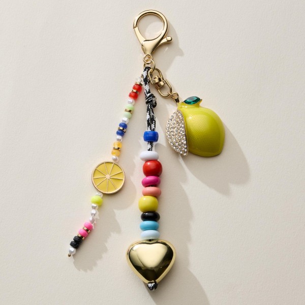 Rope Beaded Key Ring Featuring Citrus & Heart Charms 

- Approximately 7" L 