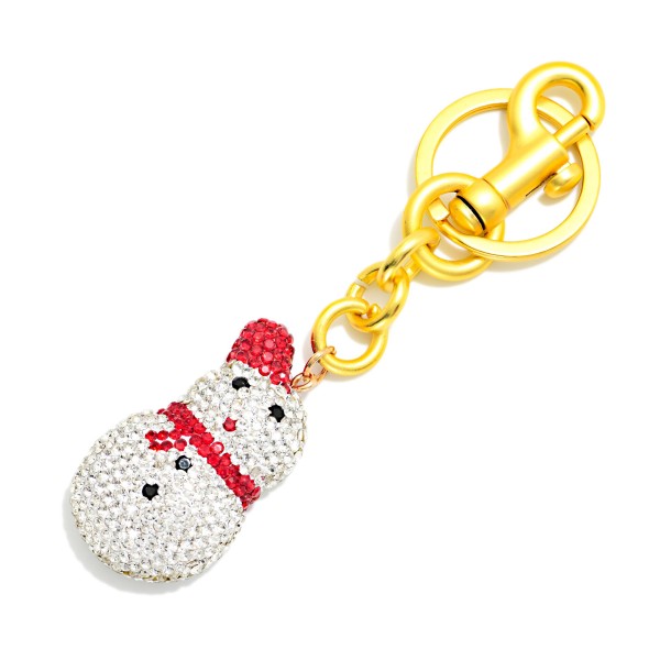 Rhinestone Snowman Keychain covered in pave set crystals with a sparkling scarf and sweet smiling face, finished with a sturdy swivel clasp and key ring. Clip it to keys, purses, backpacks, or diaper bags for a little holiday shine. A darling stocking stuffer and an easy grab for teachers, coworkers, and gift exchanges. Placed near the register, these festive keychains are a proven impulse buy all season long.