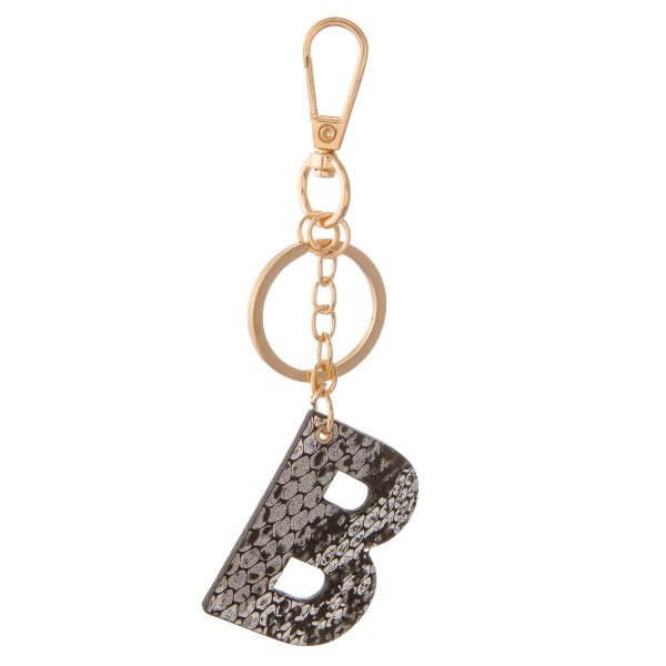 Black Metallic Faux Leather Snakeskin Initial KeyChain.

- Initial approximately 2" 
- Approximately 5" L 