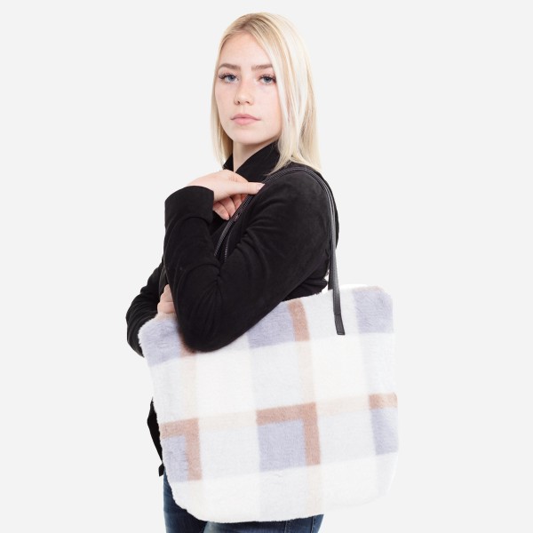 Faux Fur Plaid Print Tote Bag.

- Faux Leather Handles
- Zipper Closure
- Open Lined Inside
- One Functional Inside Pocket
- Approximately 16" W x 12" T
- 100% Polyester