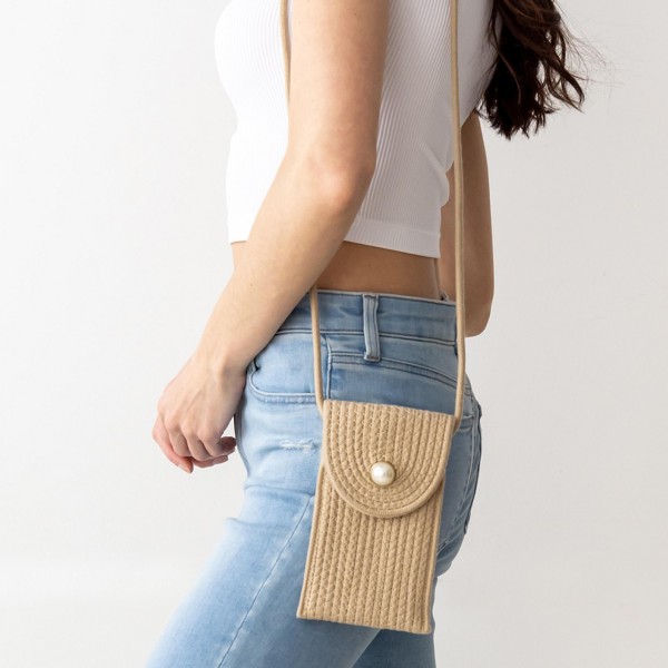 Woven Cross Body Bag Featuring a Faux Pearl Accent. 

- Snap Closure
- 

- Approximately 7" x 5" in size.
- Detachable Gold Chain approximately 48" in Length 

* Regularly priced items.