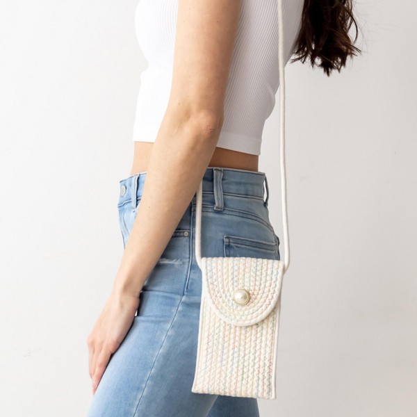 Woven Cross Body Bag Featuring a Faux Pearl Accent. 

- Snap Closure
- Strap is Approximately 23" Long 
- Approximately 7" x 5" 

* Regularly priced items.
