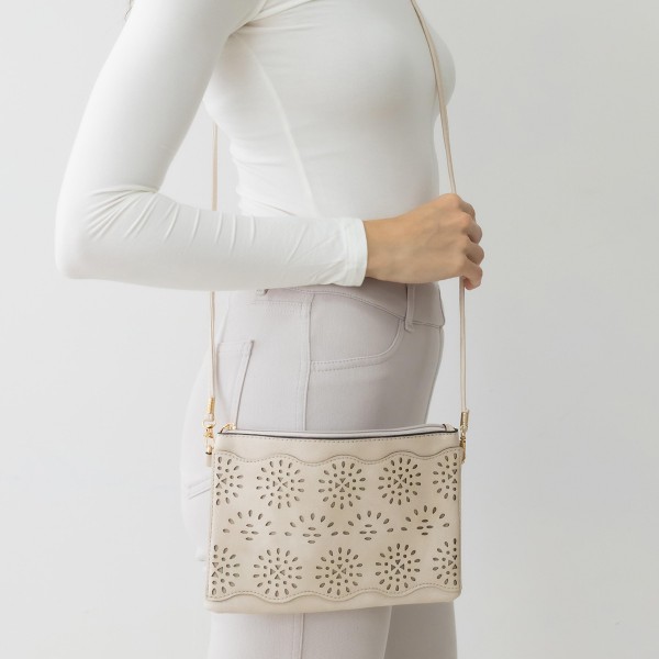 Laser Cut Tribal Flower Pattern Leather Envelope Crossbody Handbag With Removable Thin Leather Strap

- Zipper Closure
- Lined Inside
- One External Back Pocket
- Strap Drop Length Approximately 26" Long
- Approximately 6" Tall x 9" Long x 1" Wide
- 100% PU