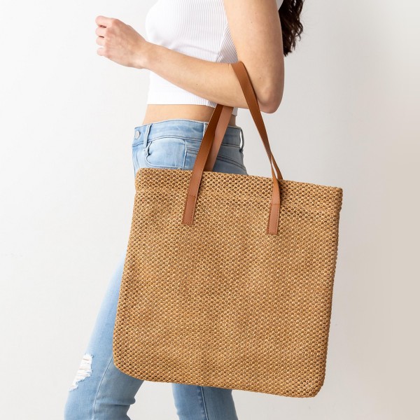 Knit Tote Bag With Removable Leather Handles

- Lined Inside
- Zipper Closure
- Three Internal Pockets: Two Loose Pockets/One Zipper Pocket
- Handle Drop Length Approximately 7" Long
- Approximately 15" Tall x 15" Long x 1" Wide
- 100% PU