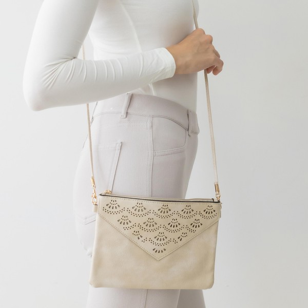 Laser Cut Lace Pattern Leather Envelope Crossbody Handbag With Removable Thin Leather Strap

- Zipper Closure
- Lined Inside
- One External Back Pocket
- Strap Drop Length Approximately 26" Long
- Approximately 6" Tall x 9" Long x 1" Wide
- 100% PU
