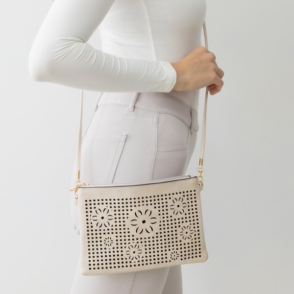 Laser Cut Flower Leather Envelope Crossbody Handbag With Removable Thin Leather Strap

- Zipper Closure
- Lined Inside
- One External Back Pocket
- Strap Drop Length Approximately 26" Long
- Approximately 6" Tall x 9" Long x 1" Wide
- 100% PU