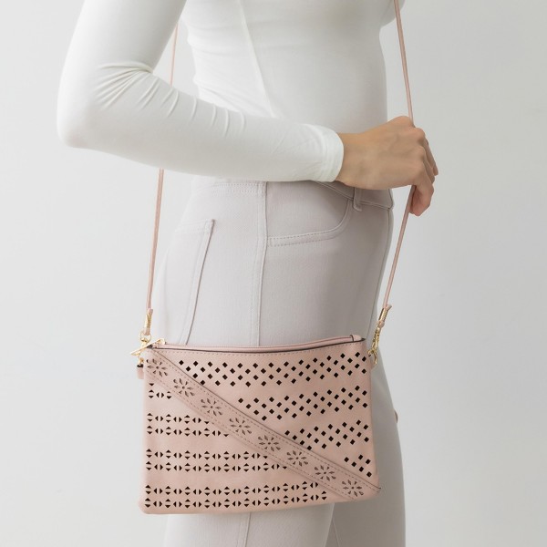 Laser Cut Tribal Pattern Leather Envelope Crossbody Handbag With Diagonal Leather Stripe Accent and Removable Thin Leather Strap

- Zipper Closure
- Lined Inside
- One External Back Pocket
- Strap Drop Length Approximately 26" Long
- Approximately 6" Tall x 9" Long x 1" Wide
- 100% PU