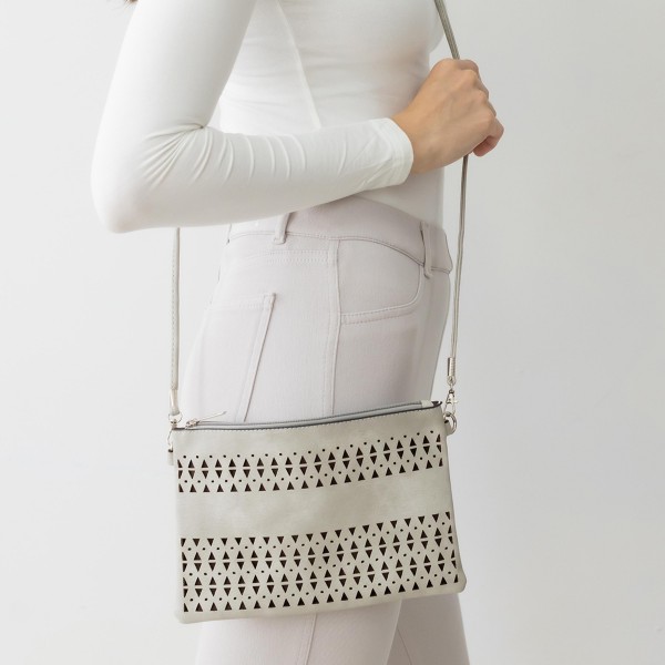 Laser Cut Tribal Triangle Pattern Leather Envelope Crossbody Handbag With Removable Thin Leather Strap

- Zipper Closure
- Lined Inside
- One External Back Pocket
- Strap Drop Length Approximately 26" Long
- Approximately 6" Tall x 9" Long x 1" Wide
- 100% PU