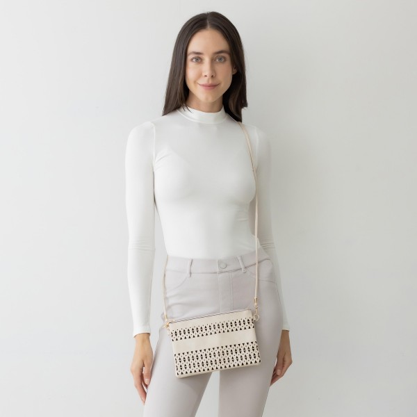 Laser Cut Tribal Triangle Pattern Leather Envelope Crossbody Handbag With Removable Thin Leather Strap

- Zipper Closure
- Lined Inside
- One External Back Pocket
- Strap Drop Length Approximately 26" Long
- Approximately 6" Tall x 9" Long x 1" Wide
- 100% PU