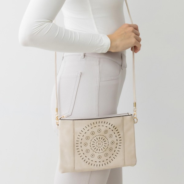 Laser Cut Tribal Sun Pattern Leather Envelope Crossbody Handbag With Removable Thin Leather Strap

- Zipper Closure
- Lined Inside
- One External Back Pocket
- Strap Drop Length Approximately 26" Long
- Approximately 6" Tall x 9" Long x 1" Wide
- 100% PU