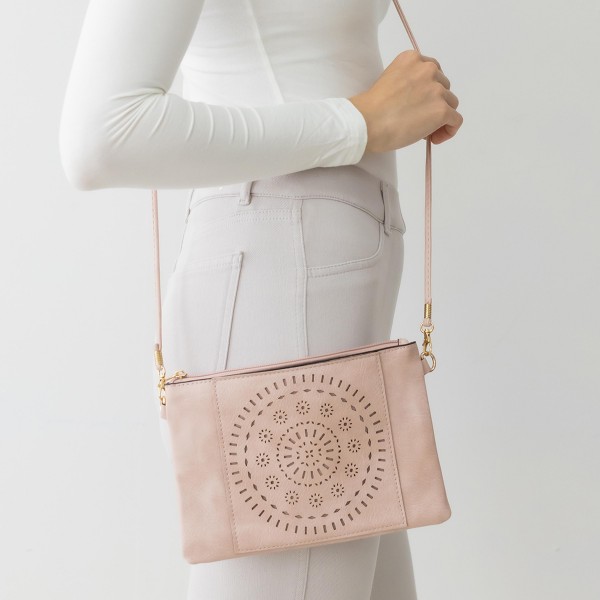 Laser Cut Tribal Sun Pattern Leather Envelope Crossbody Handbag With Removable Thin Leather Strap

- Zipper Closure
- Lined Inside
- One External Back Pocket
- Strap Drop Length Approximately 26" Long
- Approximately 6" Tall x 9" Long x 1" Wide
- 100% PU