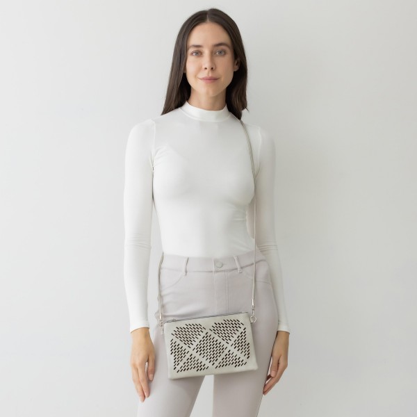 Geometric Laser Cut Leather Envelope Crossbody Handbag With Removable Thin Leather Strap

- Zipper Closure
- Lined Inside
- One External Back Pocket
- Strap Drop Length Approximately 26" Long
- Approximately 6" Tall x 9" Long x 1" Wide
- 100% PU