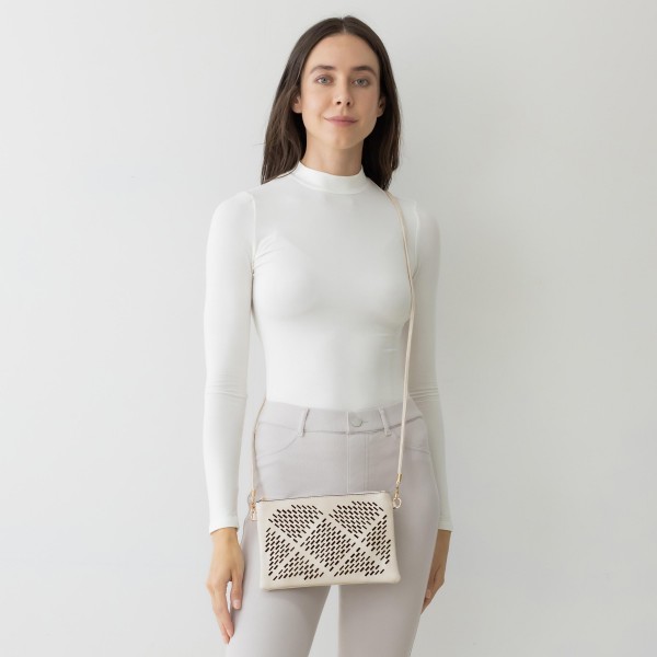 Geometric Laser Cut Leather Envelope Crossbody Handbag With Removable Thin Leather Strap

- Zipper Closure
- Lined Inside
- One External Back Pocket
- Strap Drop Length Approximately 26" Long
- Approximately 6" Tall x 9" Long x 1" Wide
- 100% PU