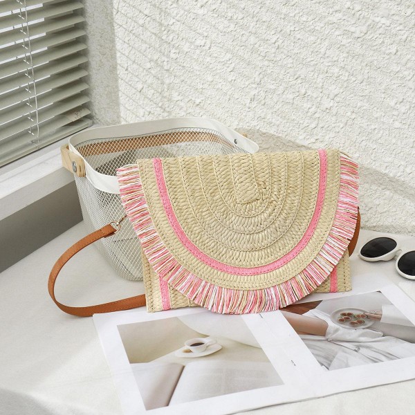 Straw Handbag With Multi-Color Fringe Hem and Detachable Faux Leather Strap

- Magnetic Closure
- Approximately 8" Long x 12" Wide
- Adjustable Strap 29" - 53" Long