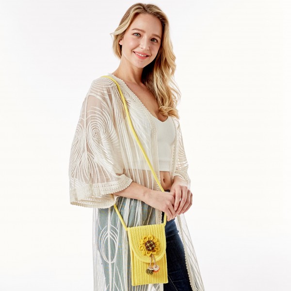 Knit Envelope Crossbody Handbag Featuring Sunflower Applique

- Magnetic Closure
- Strap Drop Length Approximately 23" L
- Approximately 8" H x 4.75" W
- 100% Cotton