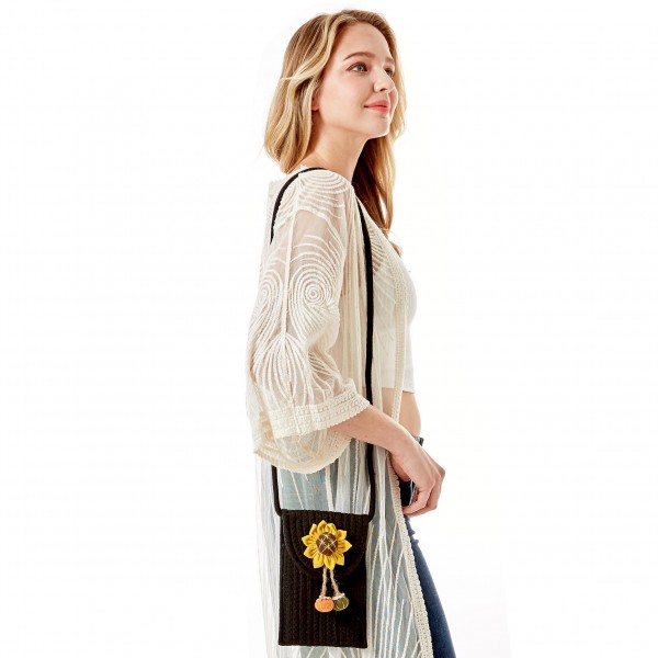 Knit Envelope Crossbody Handbag Featuring Sunflower Applique

- Magnetic Closure
- Strap Drop Length Approximately 23" L
- Approximately 8" H x 4.75" W
- 100% Cotton