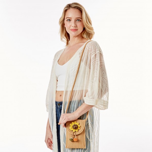 Knit Envelope Crossbody Handbag Featuring Sunflower Applique

- Magnetic Closure
- Strap Drop Length Approximately 23" L
- Approximately 8" H x 4.75" W
- 100% Cotton