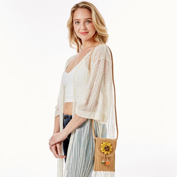 Knit Envelope Crossbody Handbag Featuring Sunflower Applique

- Magnetic Closure
- Strap Drop Length Approximately 23" L
- Approximately 8" H x 4.75" W
- 100% Cotton