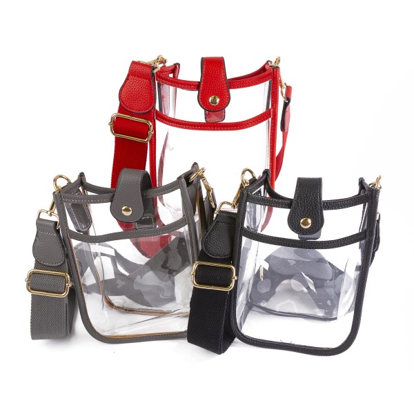 Clear PU Handbag With Matching Strap and Leather Hemlines

- Magnetic Closure
- One Outer Pocket
- Adjustable and Removable Canvas Strap Approximately 14" - 23" Drop
- Approximately 8"T x 6"L x 2"W
- Material: PU