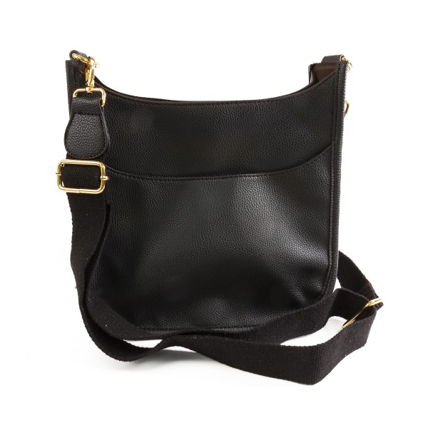 Solid Color Leather Handbag With Matching Strap

- Magnetic Closure
- One Outer Pocket
- Three Inner Pockets / One With Zipper Closure
- Adjustable and Removable Canvas Strap Approximately 14" - 23" Drop
- Approximately 10"T x 10"L x 2"W
- Material: Leather