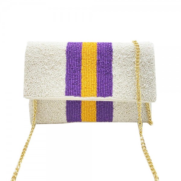 Beaded Purple And Yellow Stripe Handbag

- Magnetic Closure
- Approximately 7.5" L X 5" W
- Open Inside Pocket Approximately 3" L/W
- Gold Cross Body Removable Chain Approximately 22" L
- Spot Clean Only
-100% Cotton Canvas Bag