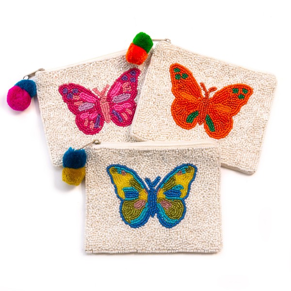 Butterfly Beaded Canvas Bag With Pom Pom Zipper

- Fully Lined Inside
- Spot Clean Only
- 100% Cotton Bag
- Approximately 5.5" W X 4.5" L