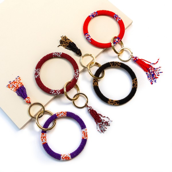 Beaded KeyRing With Beaded Tassel

- Approximately 3" Diameter 
- Removable Tassel 