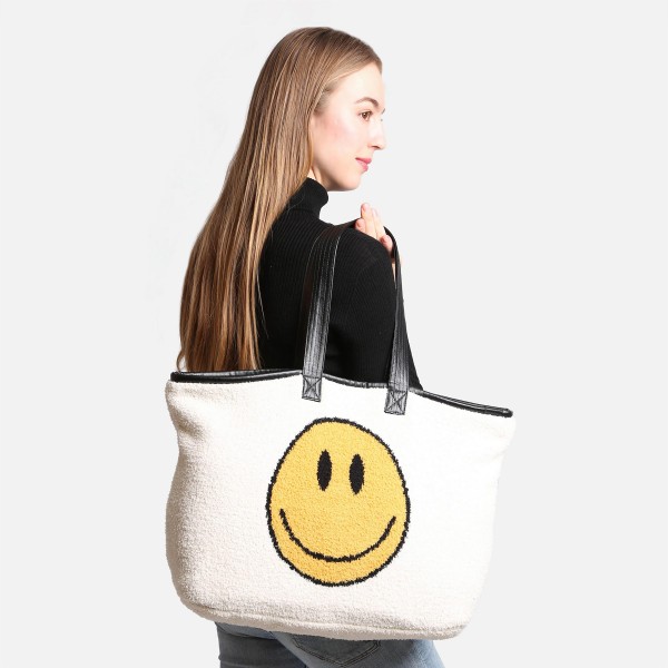 ComfyLuxe Smile Knit Tote Bag

- Two inner Pockets
- Approximately 20" W x 15" T
- 100% Poly Microfiber