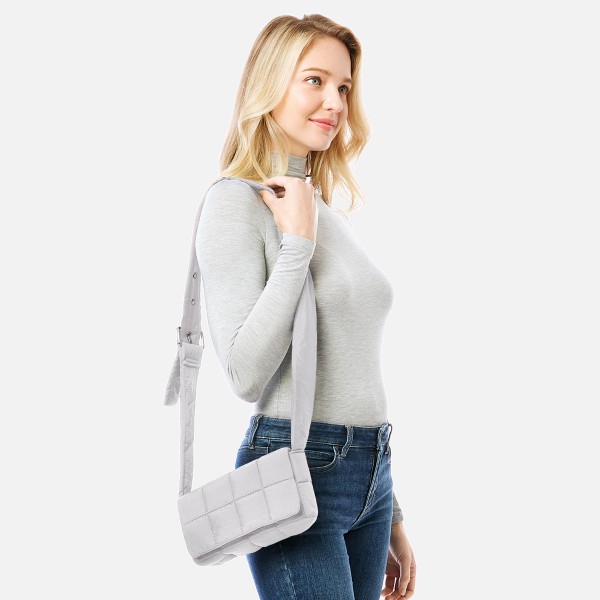 Puffy Quilt Stitch Cross Body Handbag With Adjustable Buckle Strap

- Magnetic Flap Closure
- Two Inner Pockets: One Zipper Closure / One Open
- Approximately 9" L x 4.5" T x 2.5" D
- Strap Drop Adjustable 14" - 22" L