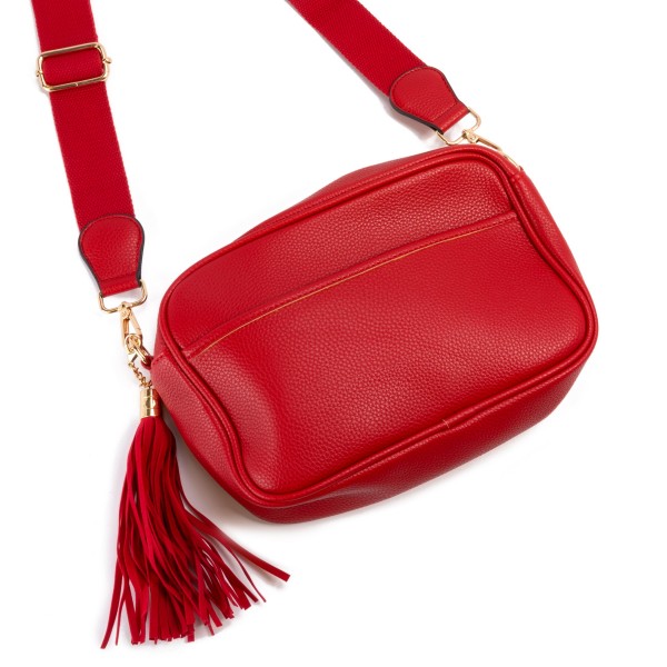 Solid Color Leather Handbag With Matching Strap and Tassel Keychain

- Lined Inside
- Zipper Closure
- Two Large Inner Pockets / One With Zipper Closure
- Adjustable and Removable Canvas Strap Approximately 14" - 23" Drop
- Approximately 6"T x 10"L x 2.5"W
- Material: Faux Leather