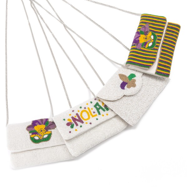 NOLA Seed Beaded Handbag With Detachable Chain Strap 

- One Inner Lined Pocket
- Magnetic Closure 
- Approximately 7"W X 4.5" T
- Approximately 21" Drop