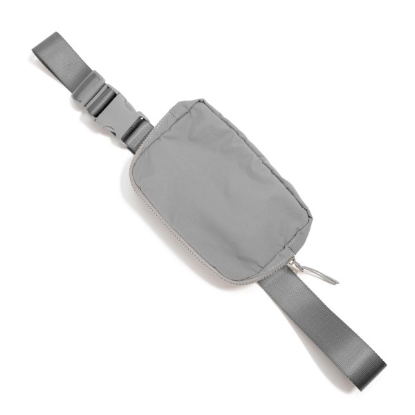 Cross Body Nylon Belt Bag
- Full Zip Closure
- Waterproof
- One Main Body Pocket With Two Inner Mesh Pockets
- Lined Zipper Pocket On Back Of Bag
- Matching Canvas Strap And Buckle (1.5" Wide)
- Adjustable Strap Approximately 20"-35" L
- Approximately 8.5"L X 5"T X 2.5"W