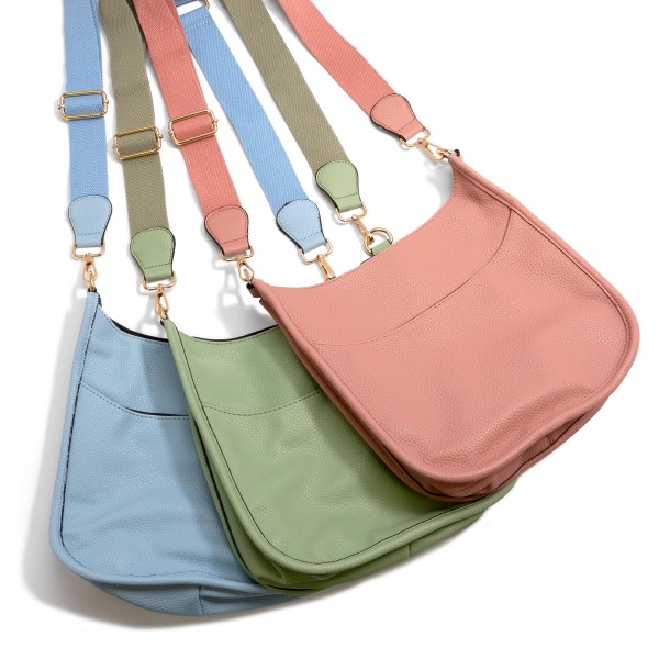Solid Color Leather Handbag With Matching Strap - Magnetic Closure - One Outer Pocket - Three Inner Pockets / One With Zipper Closure - Adjustable and Removable Canvas Strap Approximately 14" - 23" Drop - Approximately 10"T x 10"L x 2"W - Material: Leather view 5