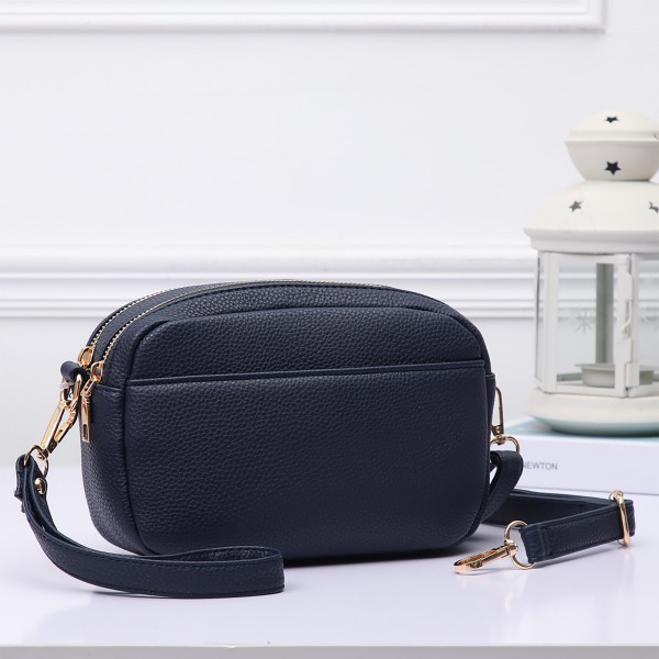 Faux Leather Double Zipper Crossbody Bag

- Two Zipper Main Body Pockets With One Internal Zipper Pocket
- Magnetic Closure Front Pocket
- Removable Wristlet Strap Included
- Removable / Adjustable Cross Body Strap
- Approximately 8" W X 5.25" T X 3" D
- Adjustable 28-48" L