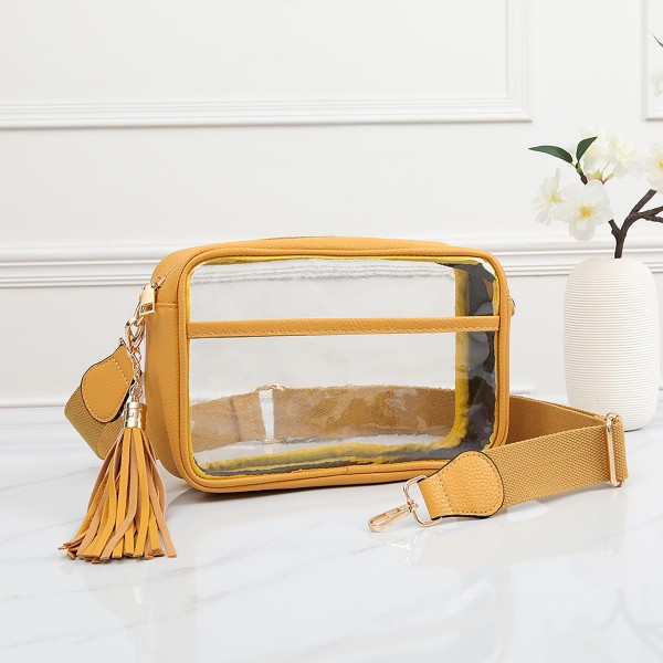 Clear PU Cross Body Bag With Leather Walls and Trim Featuring Detachable Leather Tassel

- Zip Closure
- One Outer Open Pocket
- Detachable Canvas Strap
- Approximately 6.5" T x 10" L x 2.5" W
- Strap Drop 15" - 24" L