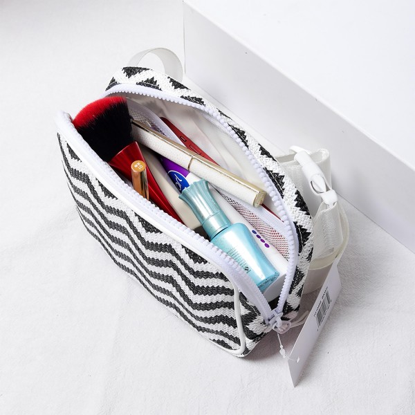 Zig-Zag Straw Sling Belt Bag Featuring Leather Trim - Adjustable Buckle Cross Body Strap - Full Zip Closure - Lined - Three Inner Mesh Pockets - Approximately 8"W x 5.5"H x 2.5"D view 5