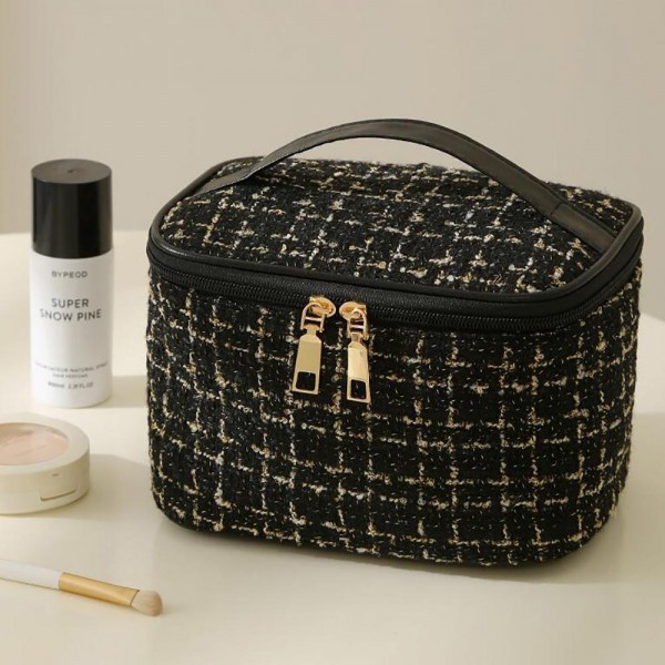 Tweed Makeup Travel Case With Top Handle

- Full Zip Closure
- Inside Zip Compartment
- Approximately 8" W X 4" T X 5.5" D