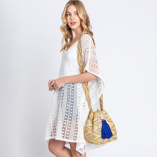 Simple Aztec Bucket Bag 

- Drawstring Closure
- Lined Body With Open & Zipper Pockets
- Approximately 12.75" W X 9.5" T X 7" D
- Strap Drop 23" T
- 50% Polyester 50% Polypropylene 