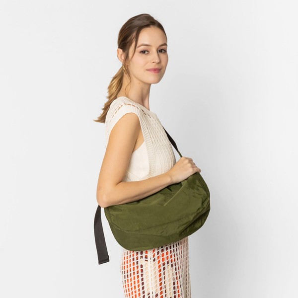 Do Everything In Love Water Resistant Crossbody Bag With Adjustable Strap

- Full Zipper Closure
- Lined Body With One Zipper Pocket
- Adjustable Strap 20" L
- Body Approximately 14" W X 8" T X 4" D
- Material : 
  Shell: 100% Nylon
  Lining: 100% Polyester 