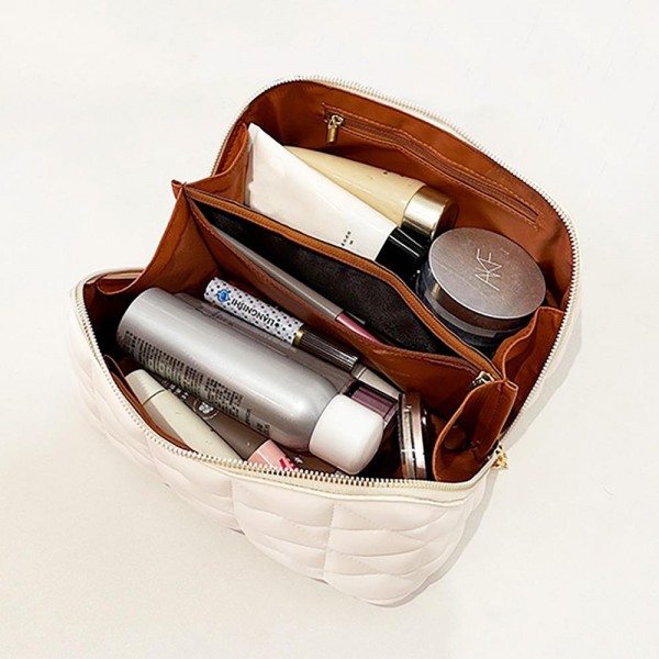 Quilted Vegan Leather Travel Makeup Bag - Full Zipper Closure - 3 Internal Side Pockets & 1 Center Zipper Brush Pocket - Center Lays Flat When Bag Is Opened - Approximately 9” L X 5” T X 4” D view 5
