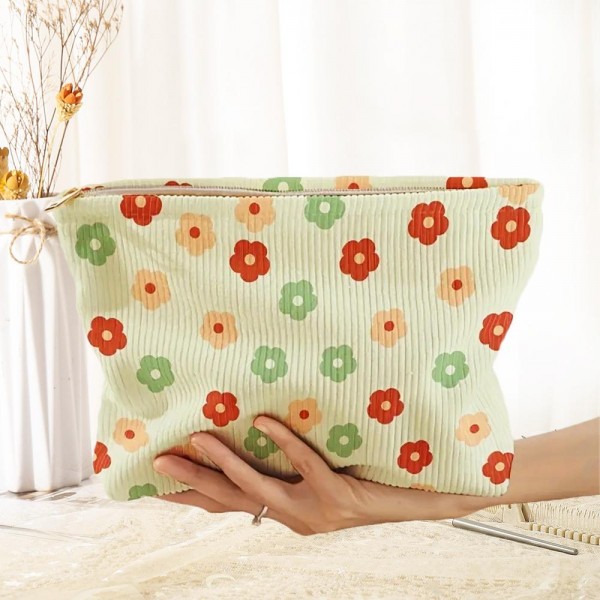 Corduroy Flowers Bow Pouch 

- Zip Closure
- Lined Body
- Approximately 10" L X 7" T X 2.25" D