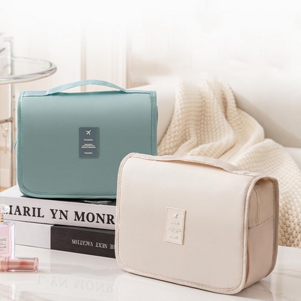 Nylon Hanging Makeup Bag
- Water Resistant 
- Velcro Closure
- 1 Outer Open Pocket 
- 4 Inner Zip Pockets
- Approximately 9" L X 7" T X 3.5" D