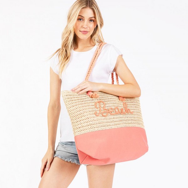 Canvas & Woven Straw Tote Bag With Rope Straps Featuring Sewn Rope "Beach" Detail 

- Full Zipper Closure
- Lined Body with Open Pocket
- Approximately 20" L X 15"T X 5" D
- Strap Drop 10" L
- 70% Paper / 30% Polyester 