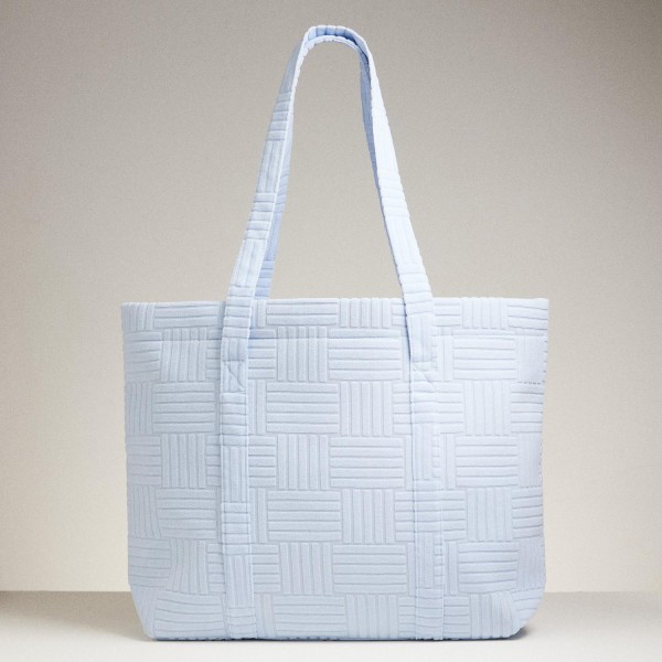 Quilted Terry Cloth Tote Bag

- Snap Closure
- Lined Body 
- Handle Drop 12" L
- Approximately 20" L X 15" T X 5" D
- 100% Polyester