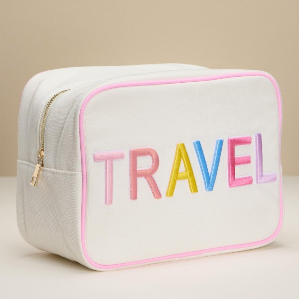 Canvas Embroidered "TRAVEL" Pouch 
- Full Zip Closure 
- Lined Body 
- Approximately 10" L X 7.5" T X 4.5" D