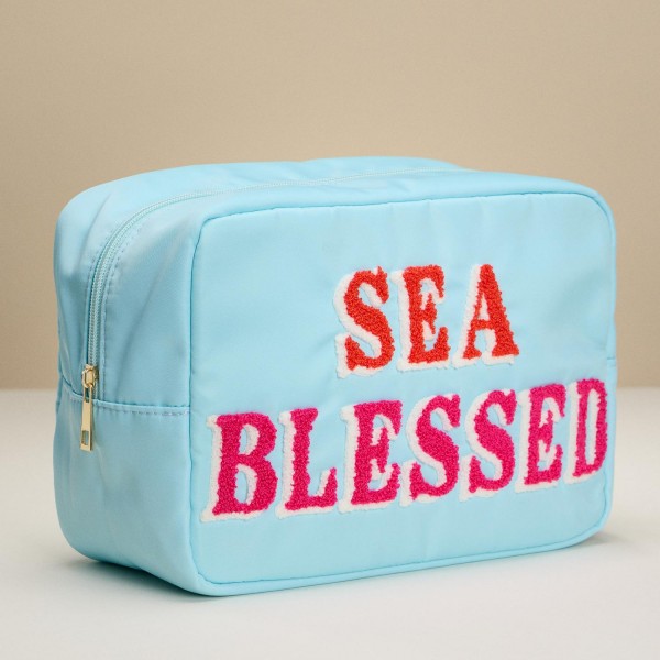 Nylon "SEA BLESSED" Chenille Patch Pouch 
- Full Zip Closure 
- Lined Body 
- Approximately 10" L X 7.5" T X 4.5" D