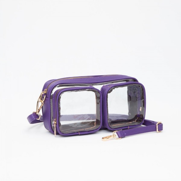 Clear Crossbody Bag With Vegan Leather Trim & Two Clear Outer Pockets 

- Zip Closure
- Removeable Vegan Leather Crossbody Strap 
- Approximately 10" L X 5.5" T X 2" D
